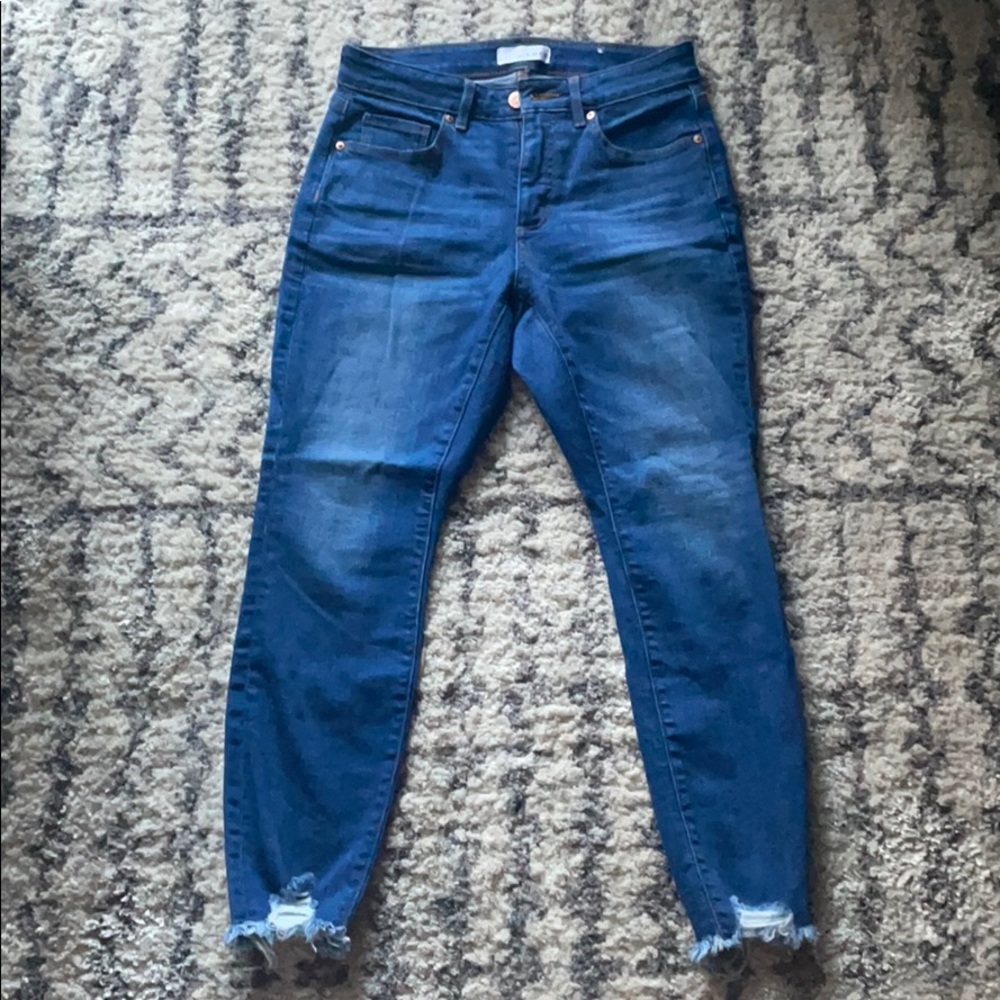 LOFT blue raw hem skinny jeans.